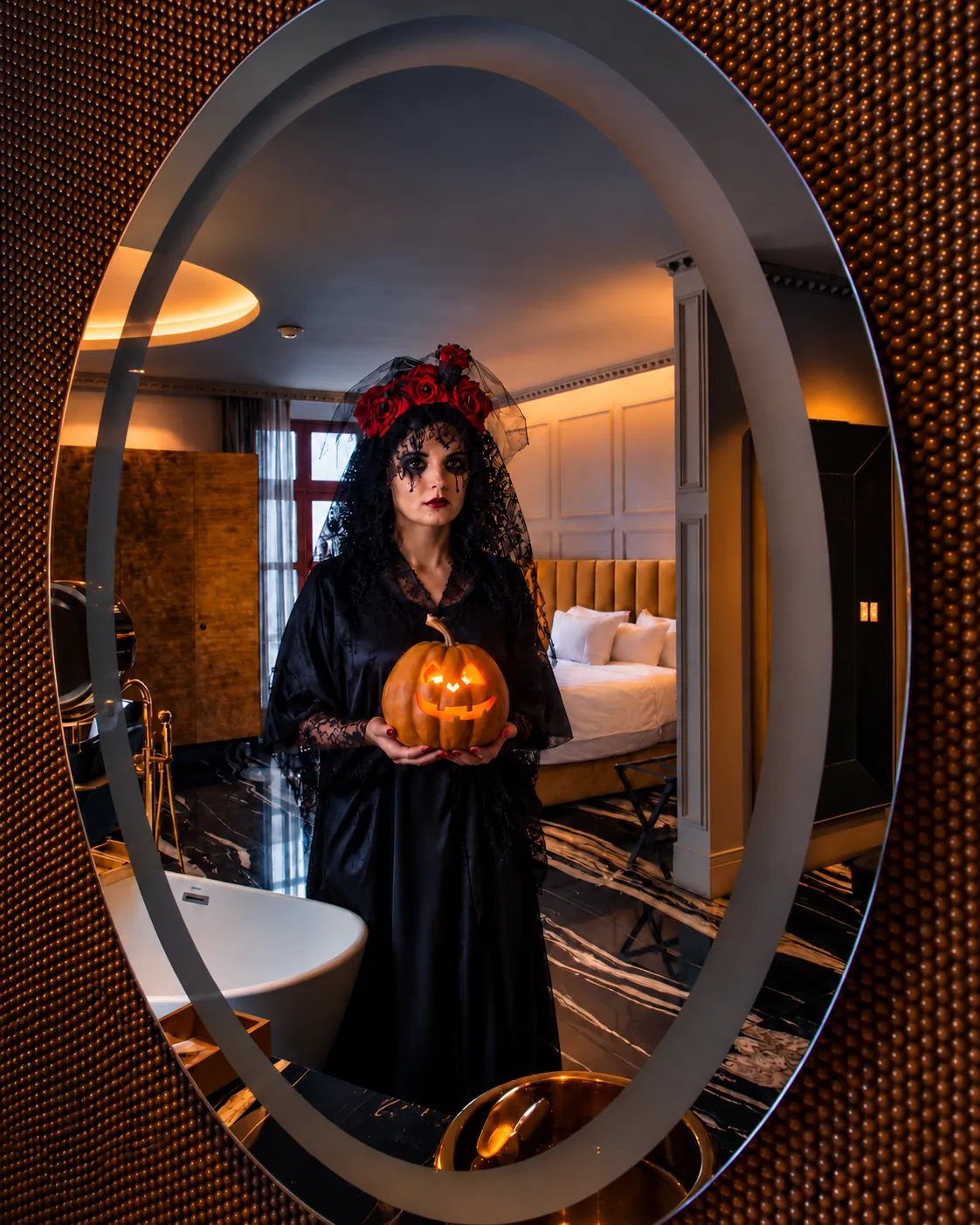 Guest wearing a Halloween costume in a hotel room